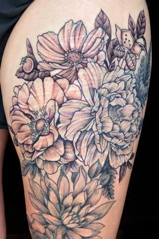 Floral scar cover-up tattoo with peonies and botanical details