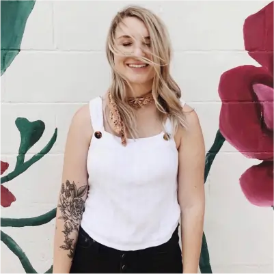 Healed floral peony tattoo with delicate petals and botanical details